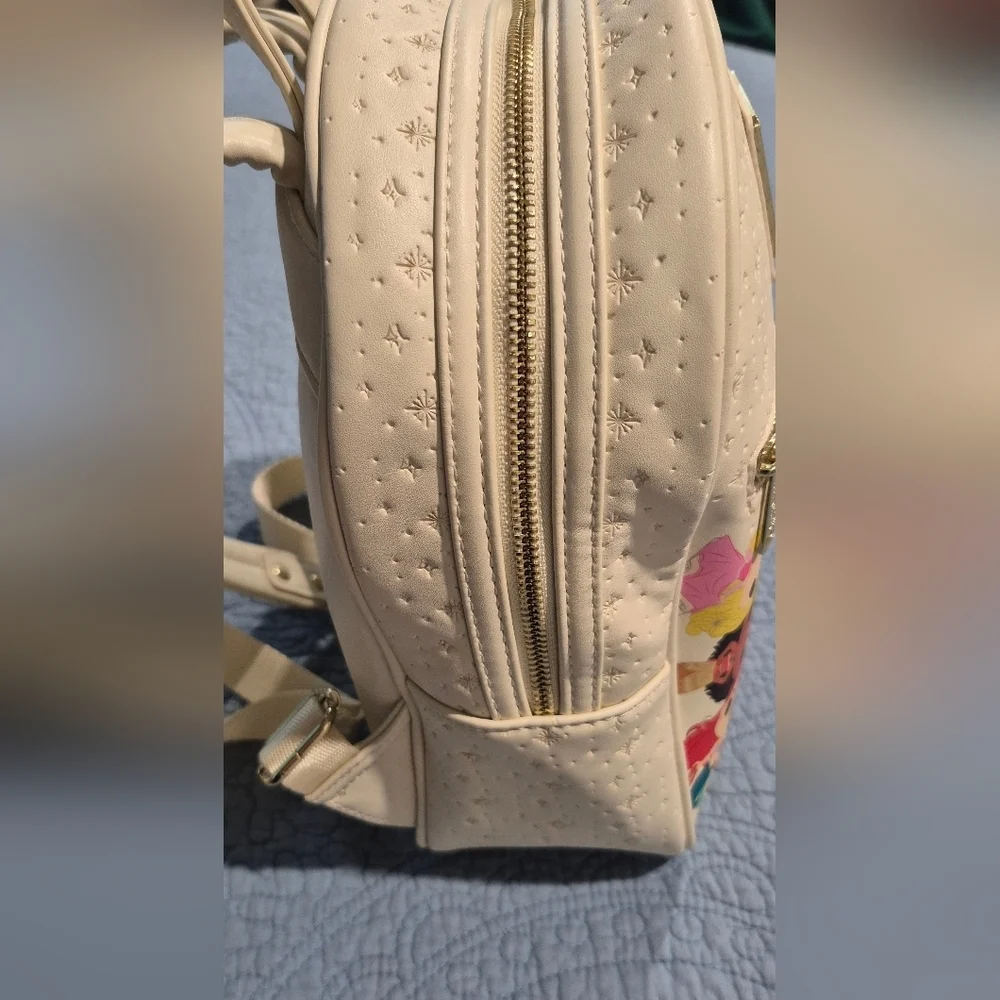 Disney Cream Backpack with Character Faces mecpl.in